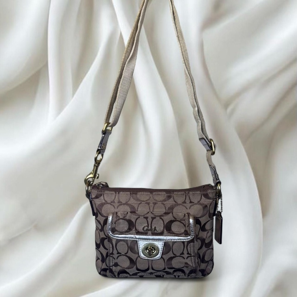 Y2K vintage Coach Signature crossbody purse featuring a front turnlock pocket